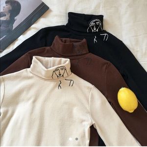 Black Drawing Turtleneck